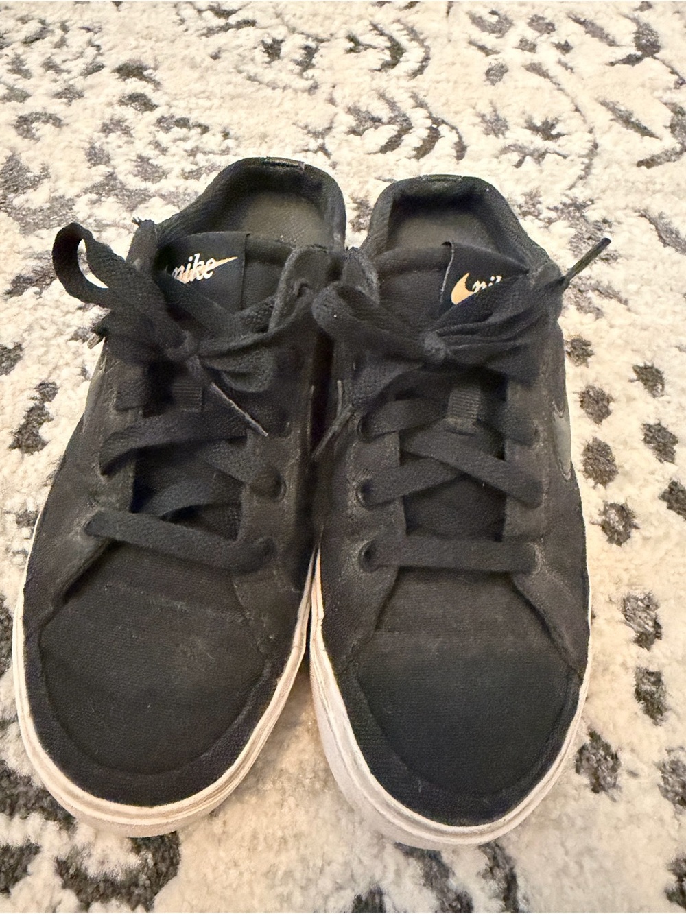 Nike Women’s Slip On Black Canvas Sneakers